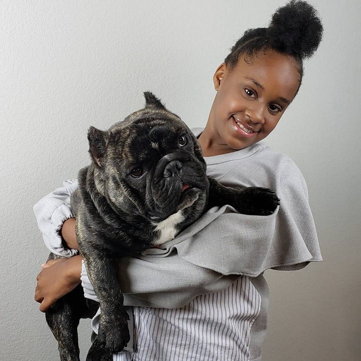 A girl carrying a Shorty Bulldog