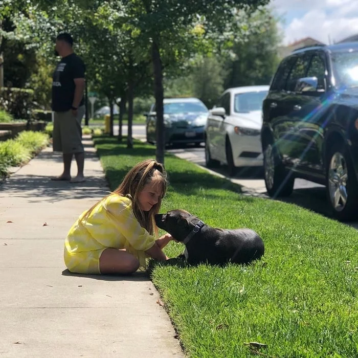 Pit Chi playing with a girl