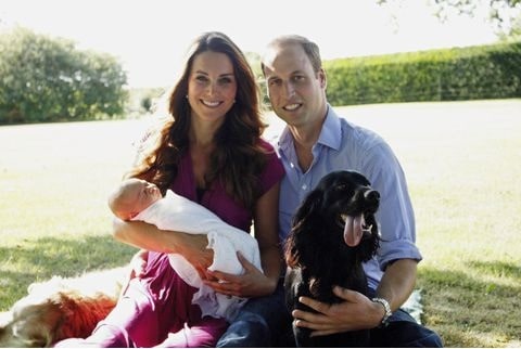 Prince William and Kate with their baby and Cocker Spaniel